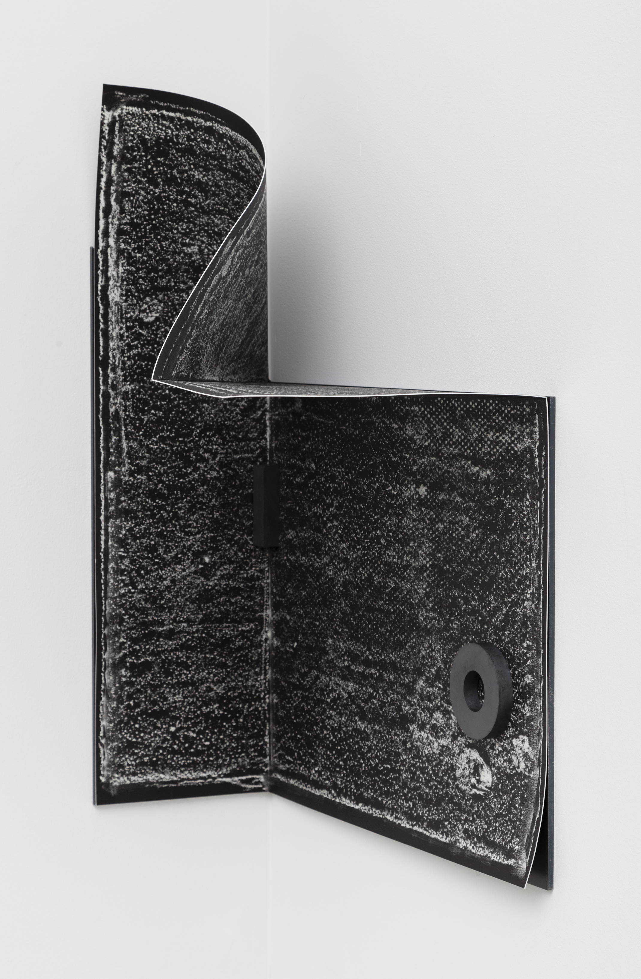 Elizabeth McAlpine  Cornerstone (mumbling) 2015 Black and white contact print, photographicemulsion, Somerset paper, steel, magnets, 61.3 x 47 x 26.4 cm 