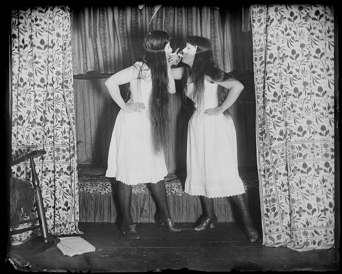 Alice Austen, <i>Trude and I Masked</i>, circa 1910. Collection of Historic Richmond Town, Staten Island, New York. Courtesy <a href=_http_/aliceausten.org/index.html target="_blank">Alice Austen House</a>
